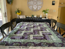 Load image into Gallery viewer, Amish Style Quality Quilt, 47”w x 62.5”l, with Purples and Greens in a Batik Fabric
