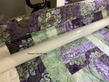 Load image into Gallery viewer, Amish Style Quality Quilt, 47”w x 62.5”l, with Purples and Greens in a Batik Fabric
