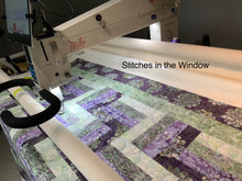 Load image into Gallery viewer, Amish Style Quality Quilt, 47”w x 62.5”l, with Purples and Greens in a Batik Fabric